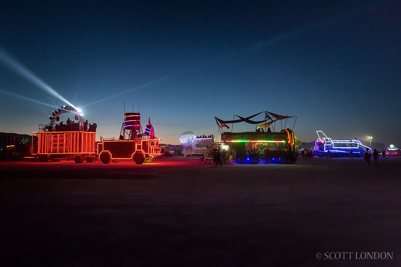 Art cars at dusk at Burning Man 2013 (Photo by Scott London)