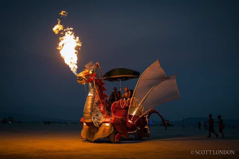 Spike the Big Red Dragon, an art car created by Colorado artist Captain Carburetor, shows off its flame poofer at Burning Man 2013 (Photo by Scott London)