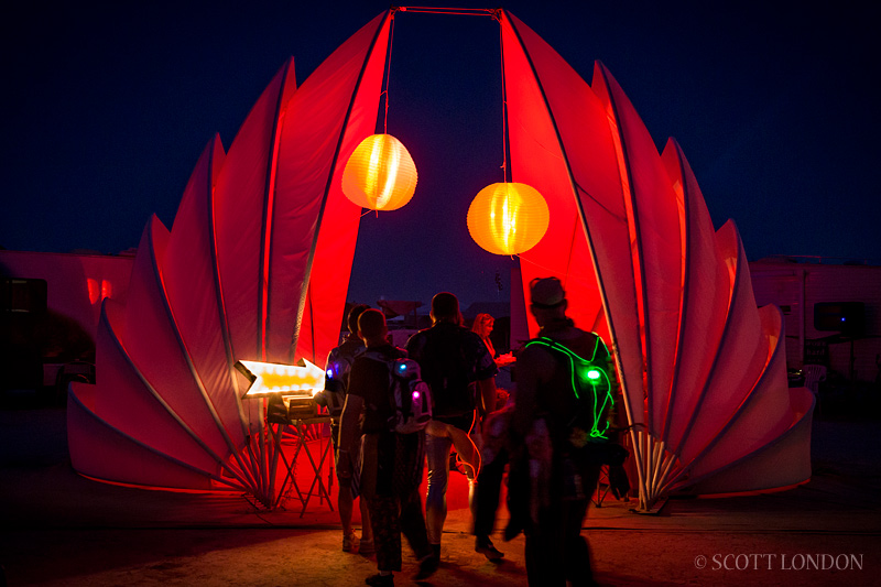 People gather at The Chiton, an sculpture created by D'Milo Hallerberg, at Burning Man 2013 (Photo by Scott London)