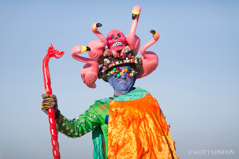 Uncle Ira, a costume designer from the Bay Area, in a piece he calls "Flamingoes and Dice" at Burning Man 2013 (Photo by Scott London)