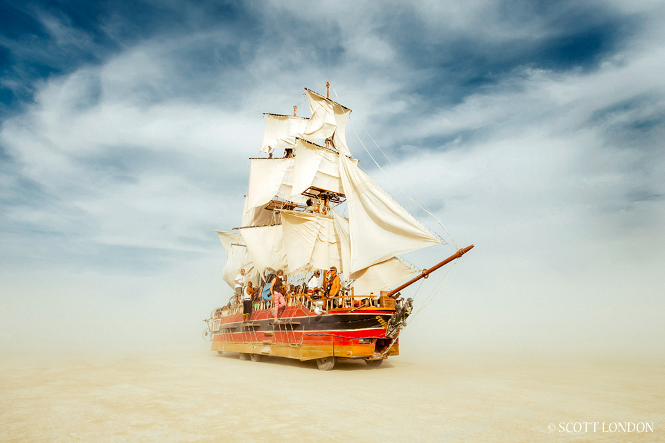 Bay Area artist Greg Barron built the Monaco on top of an old Winnebago. When the winds kick up, he kills the engine and lets the sails do the work of ferrying people across the playa. (Photo by Scott London)