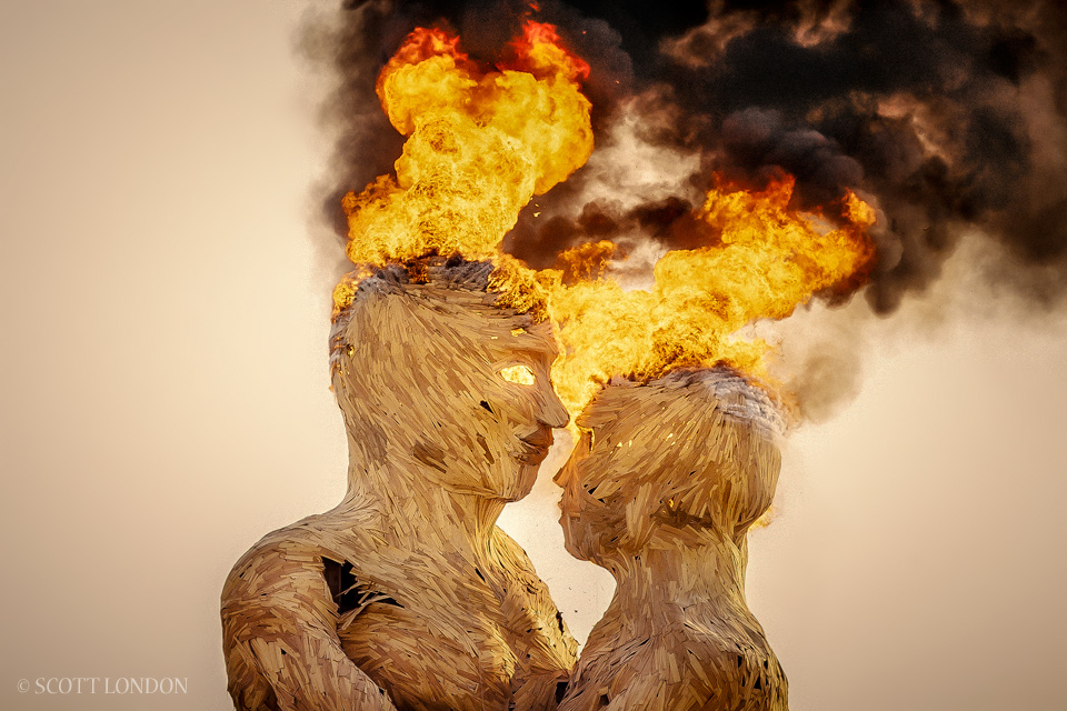 Embrace, one of the most talked-about installations at Burning Man 2014, goes up in flames on Friday morning. (Photo by Scott London)