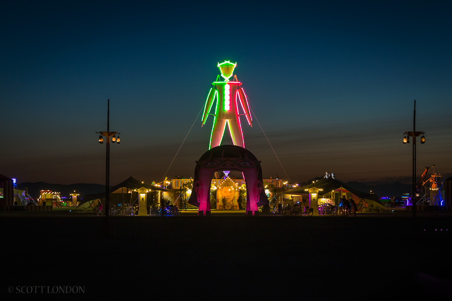 Midway and the Man in the early morning twilight at Burning Man 2015. (Photo by Scott London)
