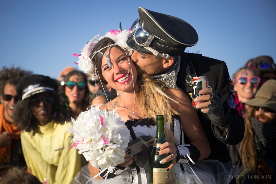 Haley and Andrew get married at Burning Man 2015. (Photo by Scott London)