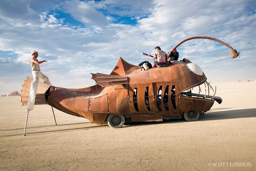 Stiltwalker and Art Car at Burning Man 2016