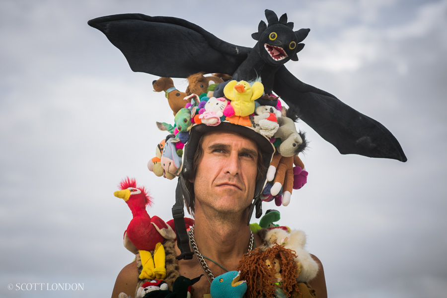 A man in a stuffed-animal helmet at Burning Man 2016. (Photo by Scott London)