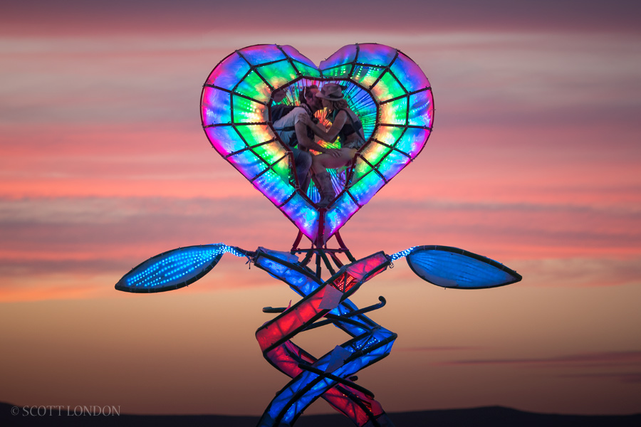 A couple kissing inside 'Ascension,' an installation by Jeremy Richardson at Burning Man 2016. (Photo by Scott London)
