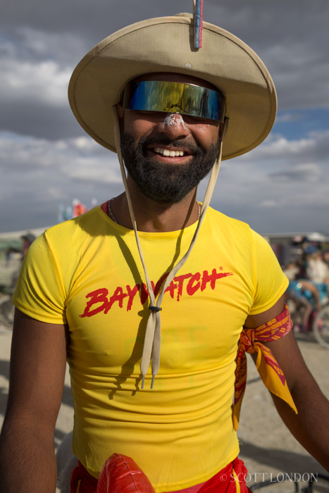 A burner in a stylish Baywatch T-shirt at Burning Man 2016. (Photo by Scott London)