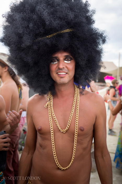A man with a giant-ass wig at Burning Man 2016. (Photo by Scott London)