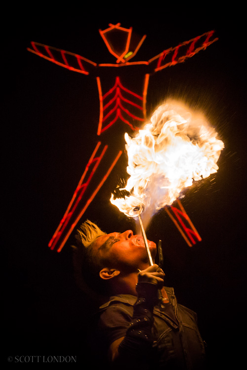 A performer with the Los Angeles-based troupe Hellfire Society performs at Burning Man 2016. (Photo by Scott London)