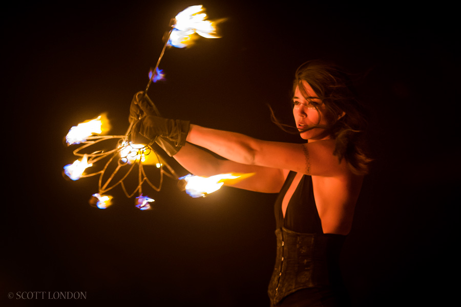 A dancer with the Los Angeles-based Hellfire Society performs before the Man goes up in flames at Burning Man 2016. (Photo by Scott London)