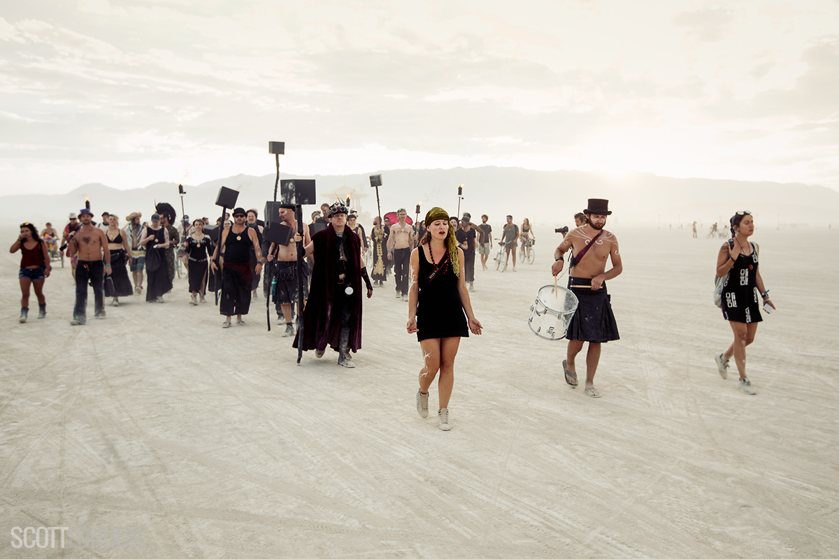 A procession organized as part of the performance project Solipmission by Dadara at Burning Man 2017. (Photo by Scott London)