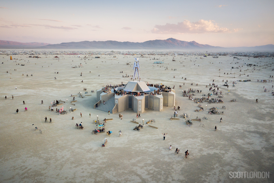 Aerial view of the Man standing atop the pavilion at Burning Man 2018. (Photo by Scott London)
