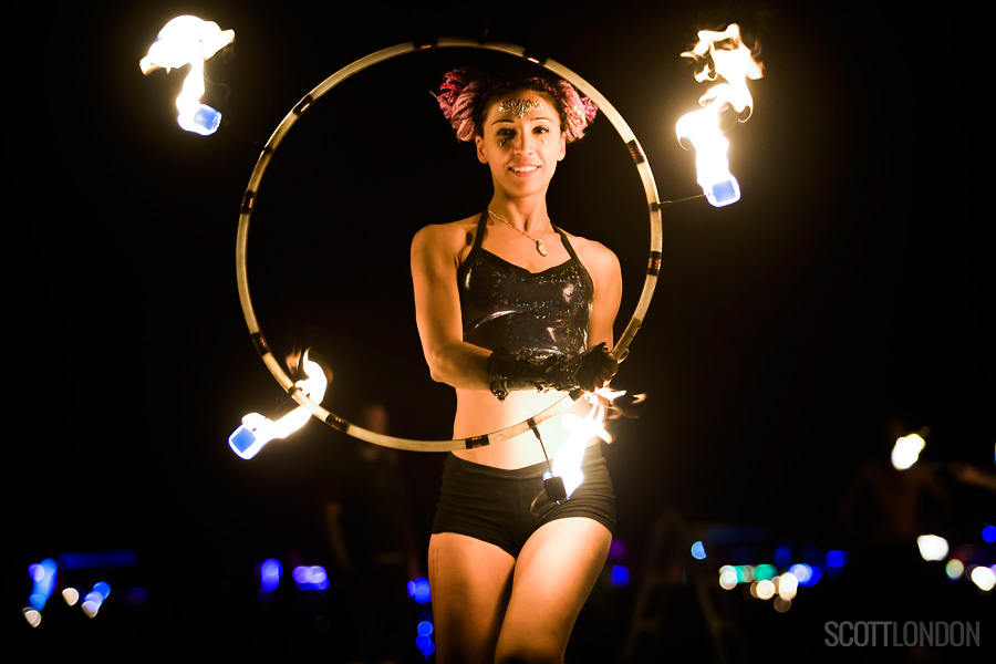 A fire dancer with the Hellfire Society at Burning Man 2018. (Photo by Scott London)