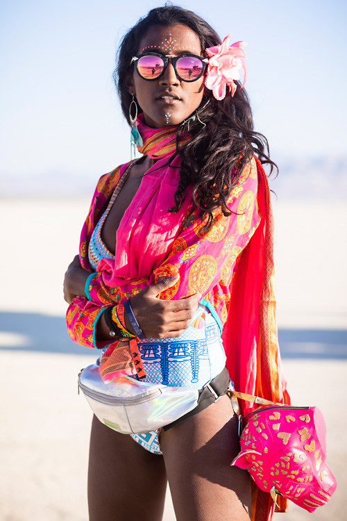 Seema, a Burner wearing an outfit and accessories by Indian designer Manish Arora at Burning Man 2018. (Photo by Scott London)