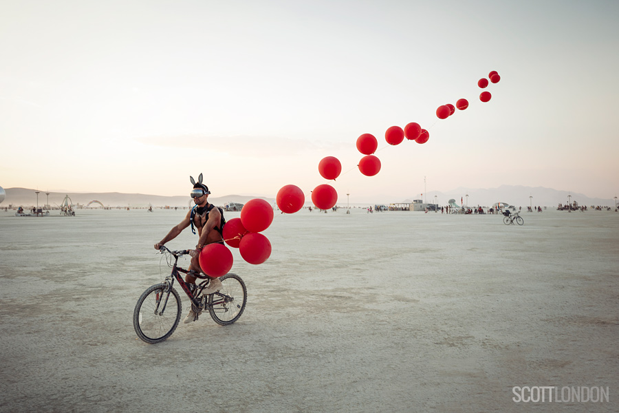 Abed and his red balloons at Burning Man 2018. (Photo by Scott London)