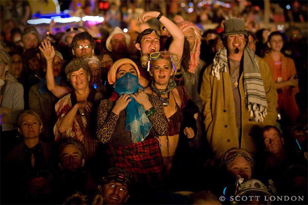 The Crowd Watches the Man Go Up in Flames