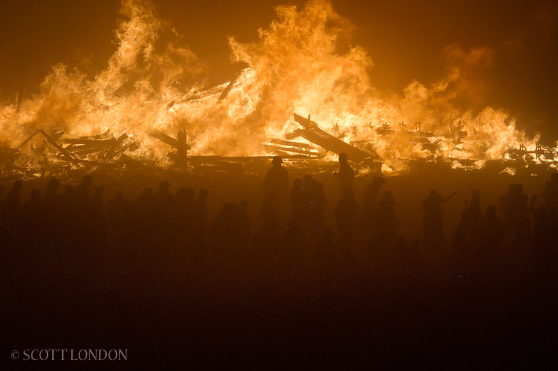 Crowds Encircle the Flames