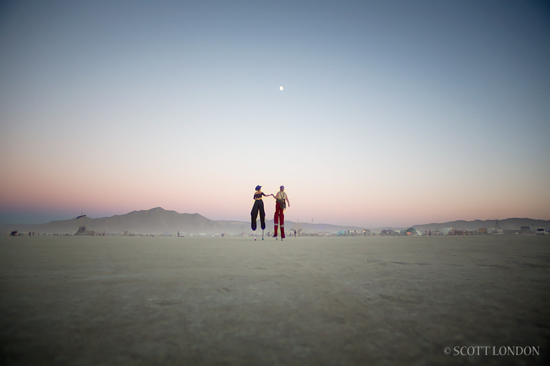 Stiltwalkers at Dusk