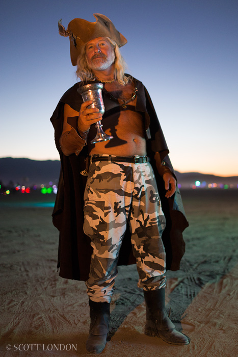 Jeremy has damn fine taste in both women and drink. And gorgeous hair. (Photo by Scott London)