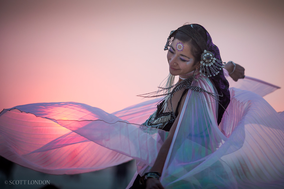 Ana ancing at sunrise at Burning Man 2014 (Photo by Scott London)