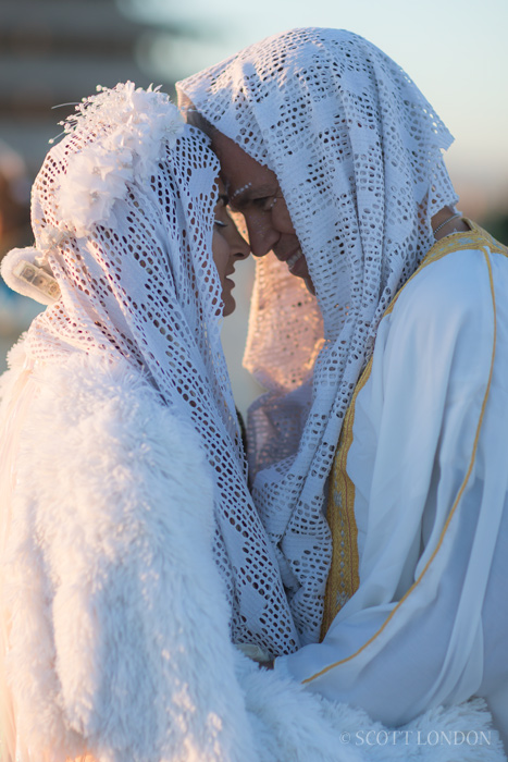 A couple in white at Burning Man 2016. (Photo by Scott London)