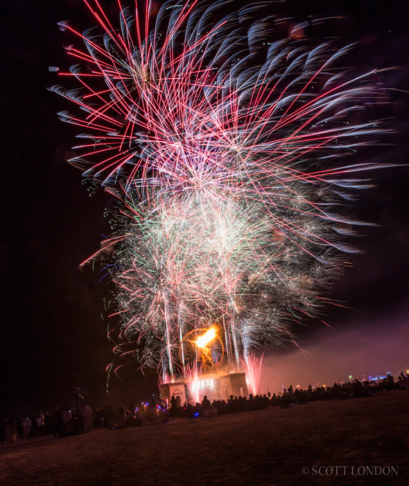 Fireworks go off before the man is burned at Burning Man 2016 (Photo by Scott London)