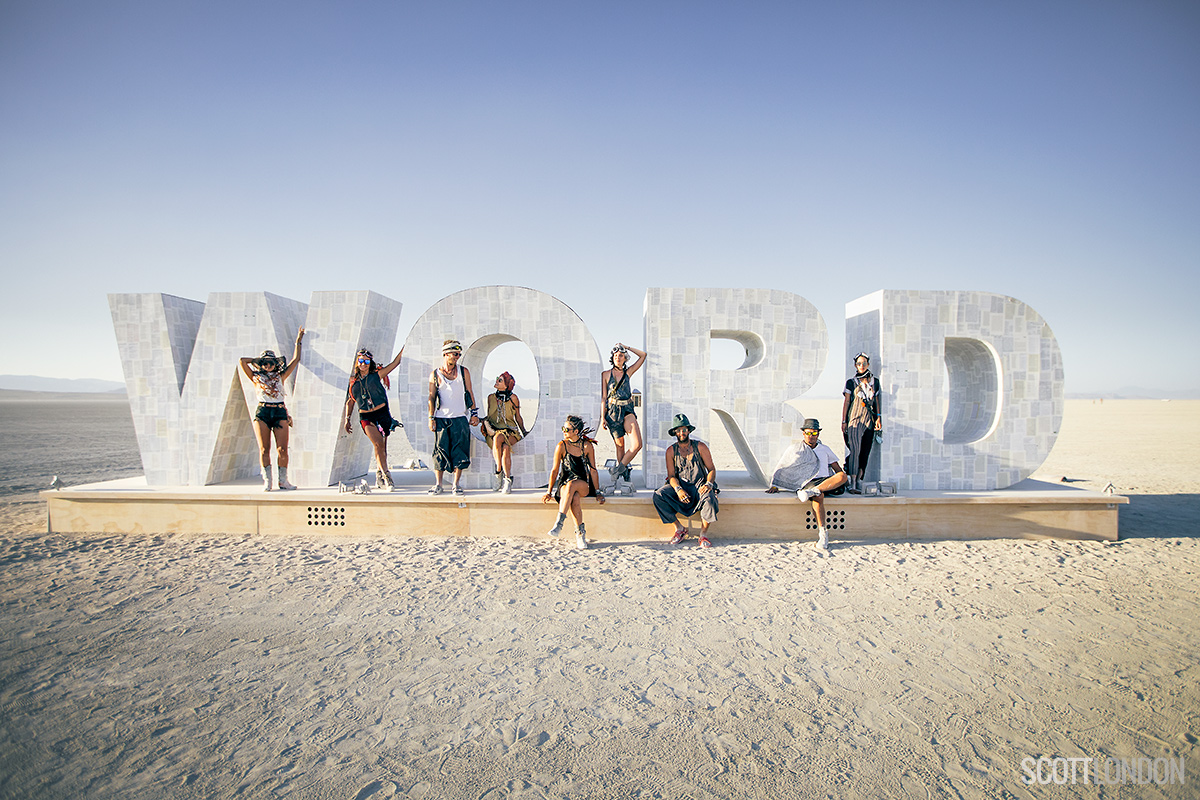 Friends gather at 'Wordless,' an installation by Lorenz Sell at Burning Man 2017. (Photo by Scott London)