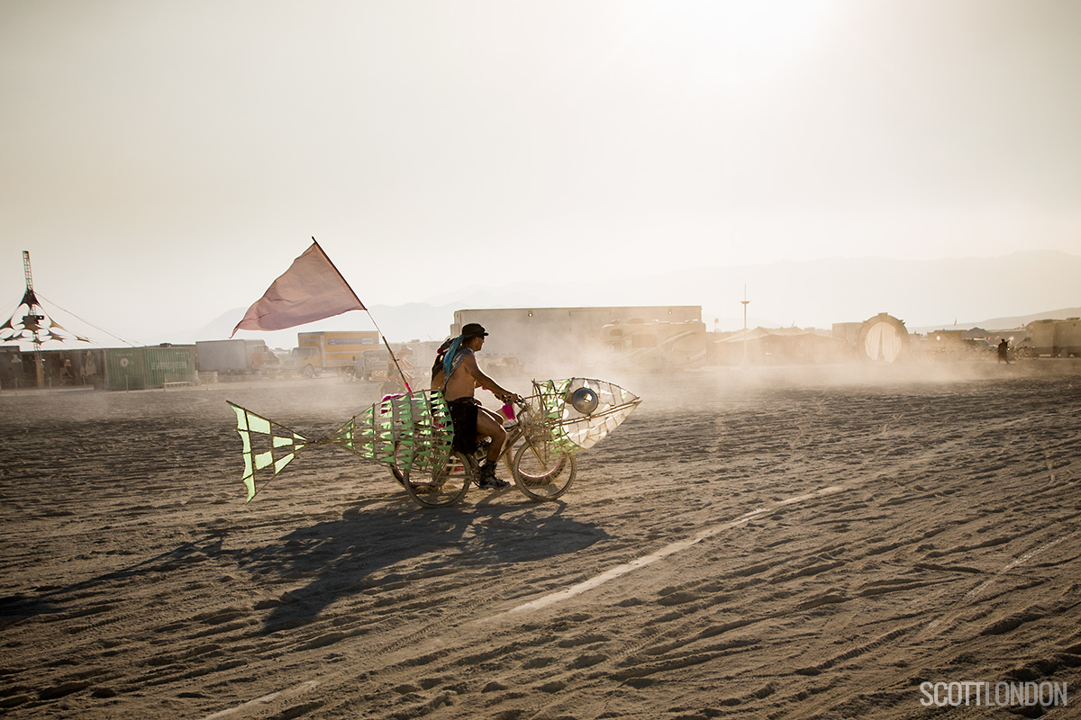 A man on a fish bicycle at Burning Man 2017. (Photo by Scott London)