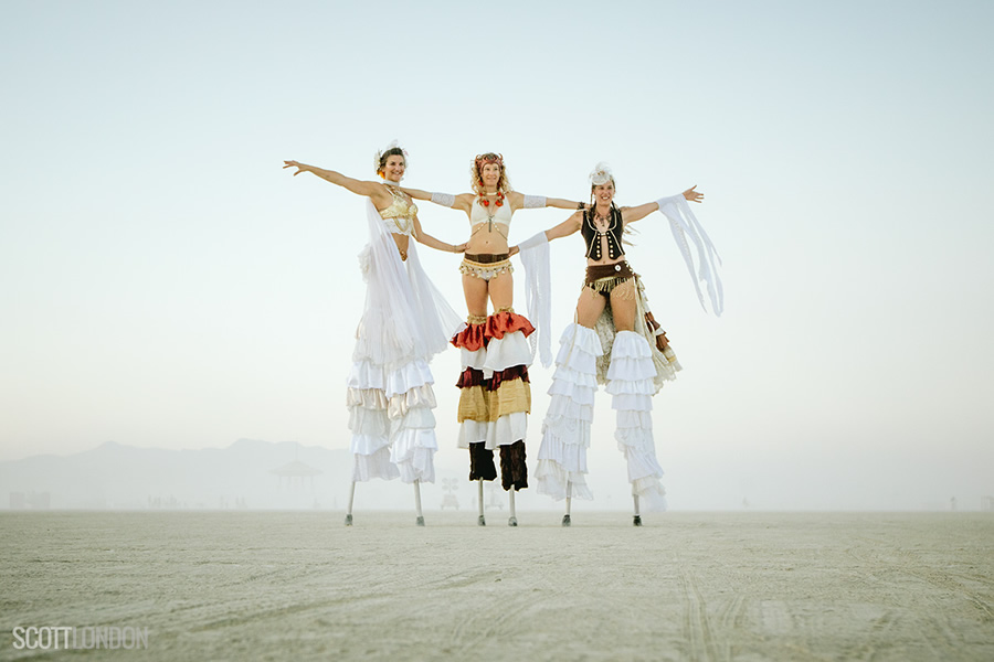 Three lovely stiltwalkers at Burning Man 2017. (Photo by Scott London)