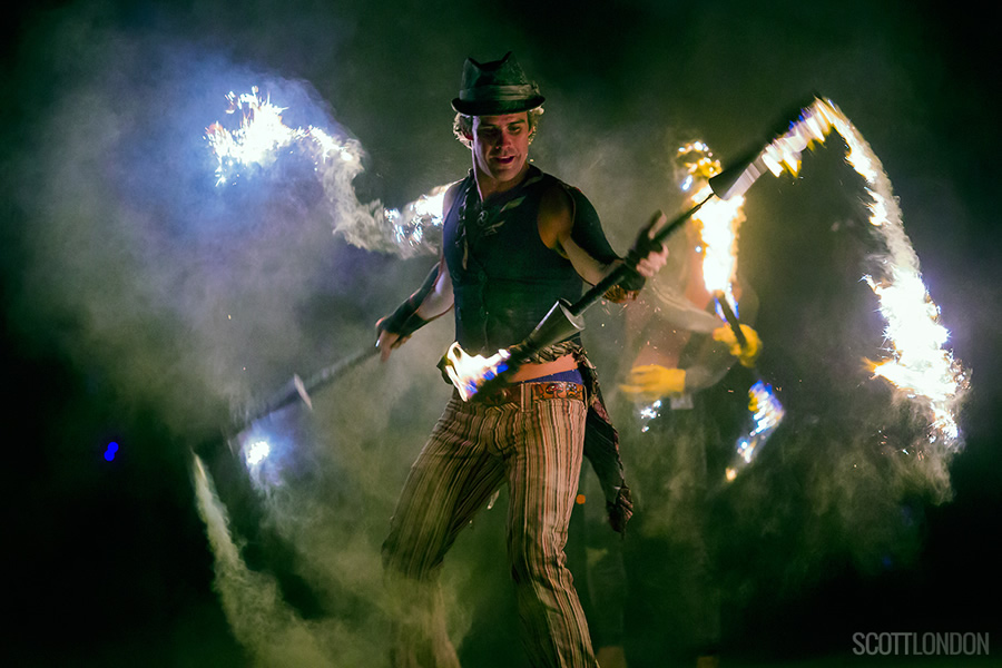 A performer with the fire troupe Fractal Tribe puts on a show before the Man goes up in flames at Burning Man 2017. (Photo by Scott London)